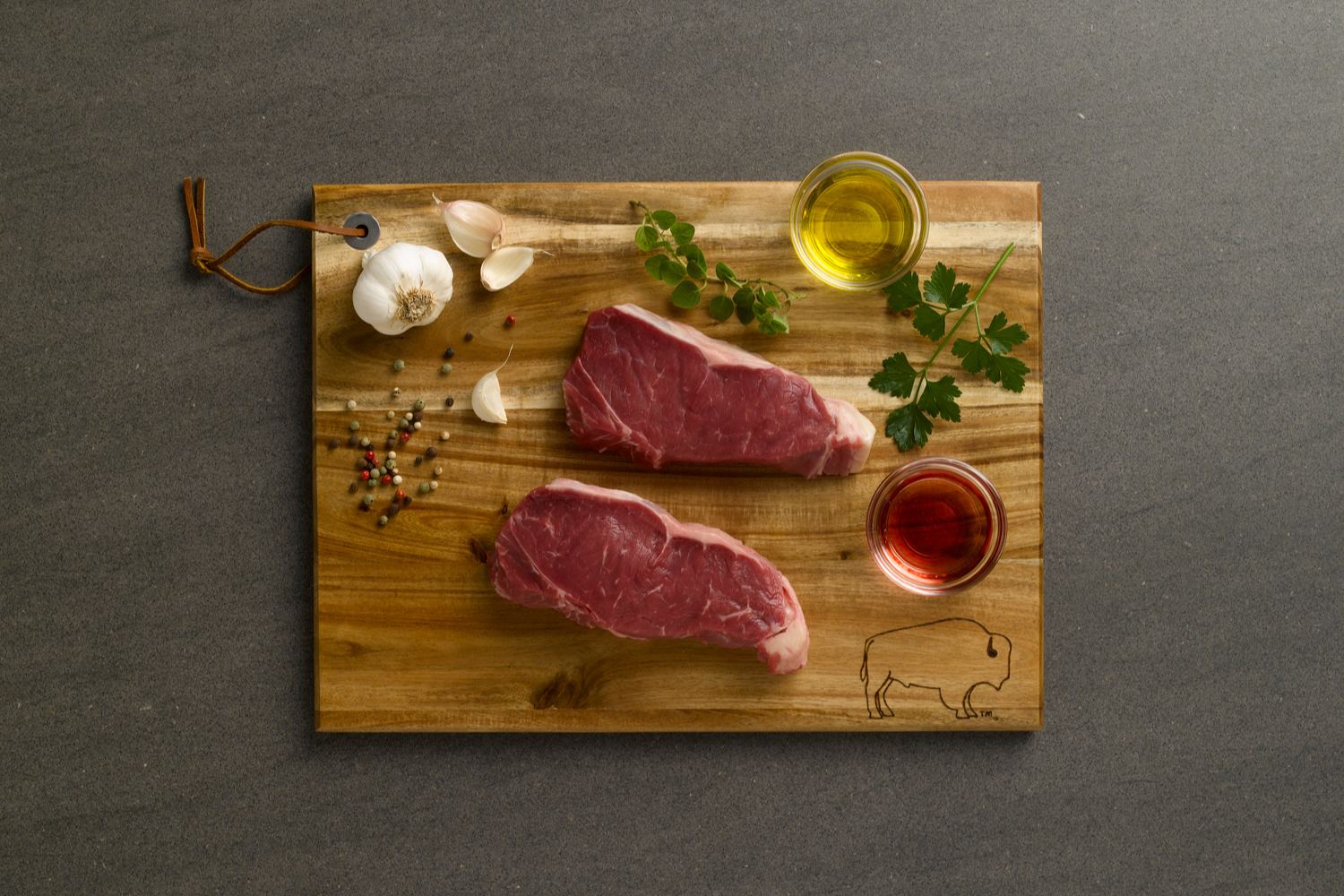 bison-strip-steak-with-red-onion-marmalade-fold bison-strip-steak-with-red-onion-marmalade-fold